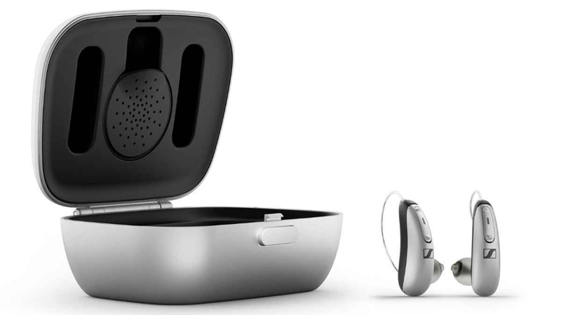 Sennheiser All-Day Clear OTC hearing aids with charging case.