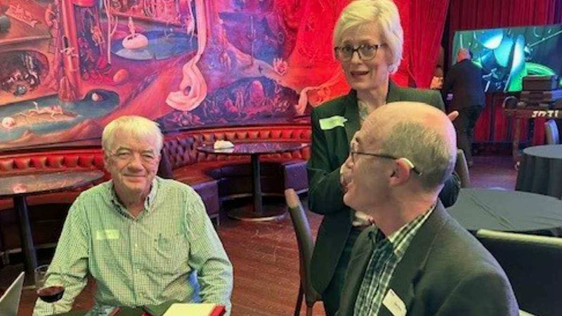 Digby Cook (left) and myself (right) demoing the Phonak Audéo Sphere Infinio RIC hearing aids with the help of Anne Miller, AuD.
