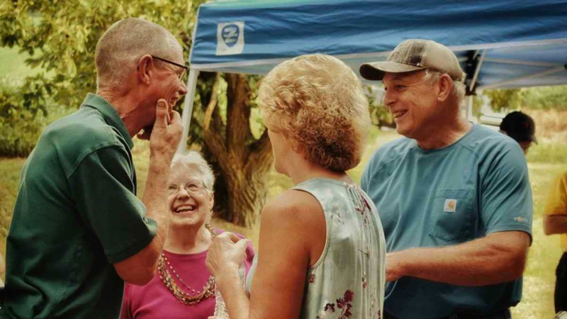 Seniors Chatting Outdoors