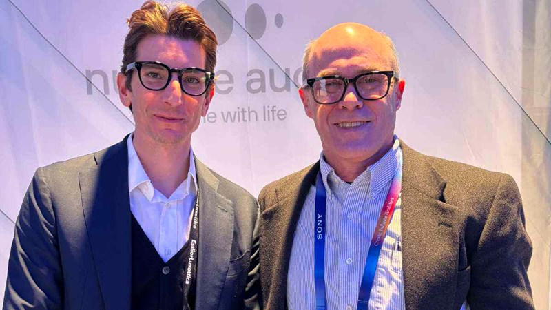 Nuance's Davide D'Alena and HearingTracker's Karl Strom wearing Nuance glasses