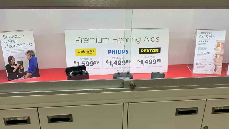 Costco display case showing Jabra, Philips, and Rexton hearing aids.