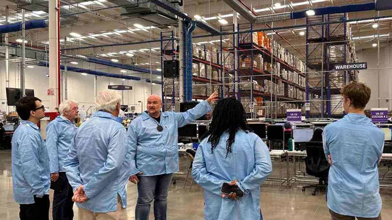 WSA Vice President of Operations Rob Walesa shows guests and media around the new high-tech AMDC manufacturing facility.