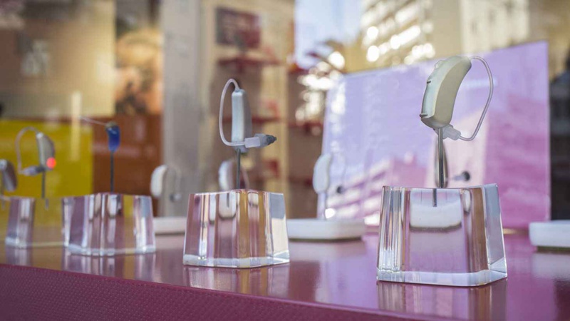 Hearing aids on display in a high street shop