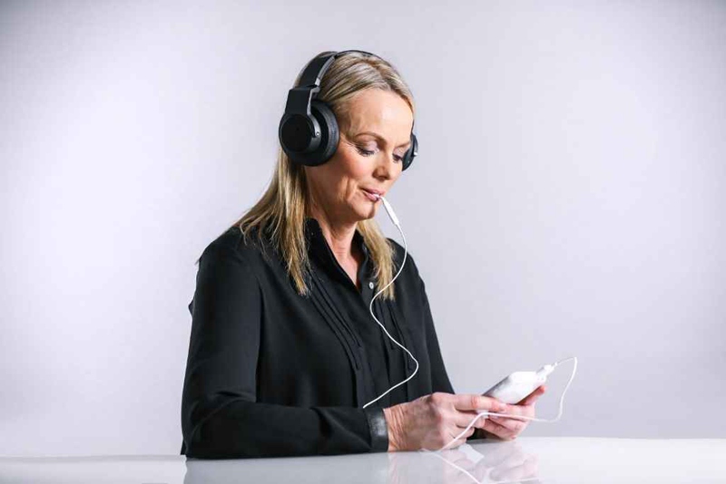 A patient uses the Lenire device. Source: Neuromod Devices