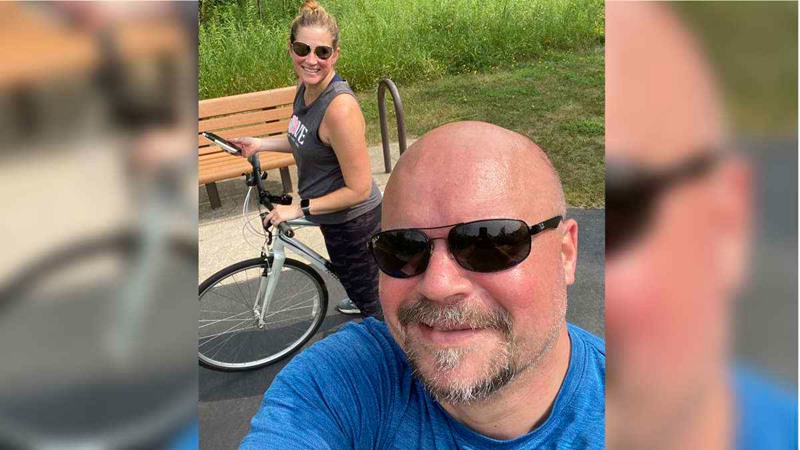 Mikkel with his wife on a bike ride.
